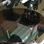 Custom R-Theta-Z stage integrated to high mag microscope